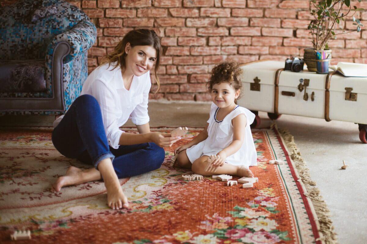 Young Pretty Mother In White Shirt And Little Cute Daughter In W