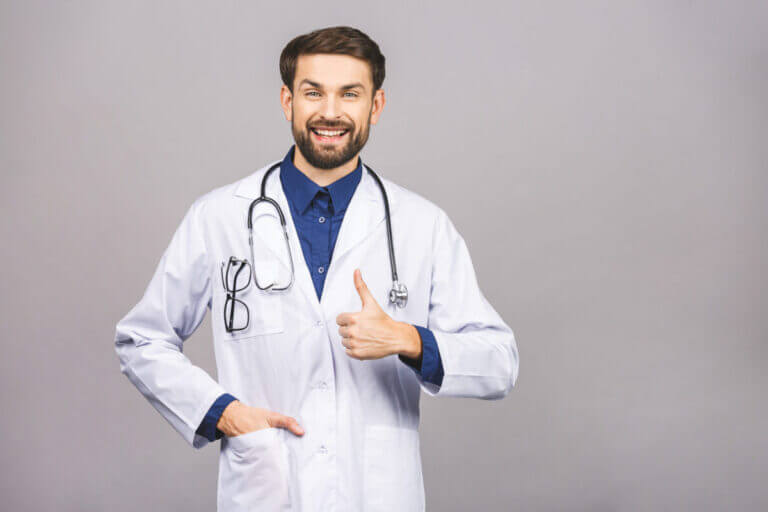 Portrait,Of,Cheerful,Smiling,Young,Doctor,With,Stethoscope,Over,Neck