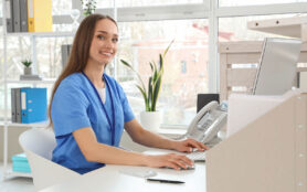 Hispanic,Male,Nurse,With,Inventory,Laughing,And,Having,Fun.