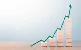 Wooden,Block,Statistics,Graph,With,Arrow,Showing,Exponential,Growth,Trend