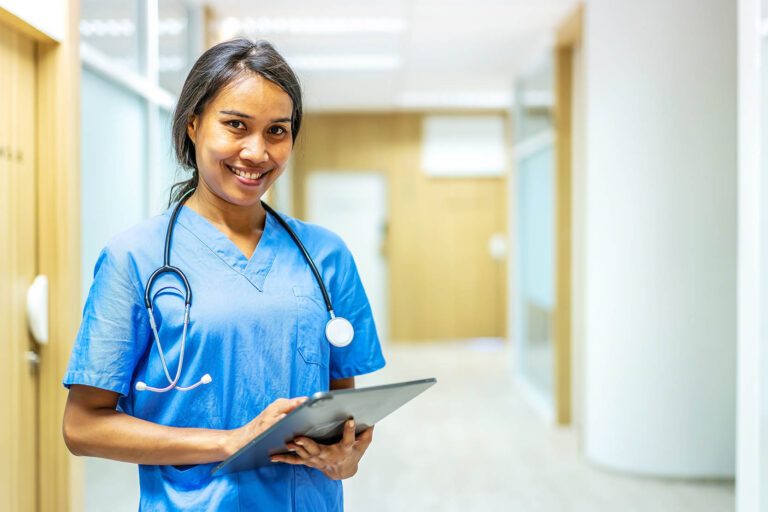Portrait,Of,Smiling,Asian,Nurse,Or,Female,Doctor,Health,Worker