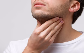 Close,Up,Of,Sick,Man,Suffering,From,Throat,Problems,,Grey