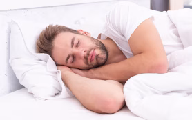 Resting,Peacefully,In,Comfortable,Bed.,Lying,With,Closed,Eyes.,Deep