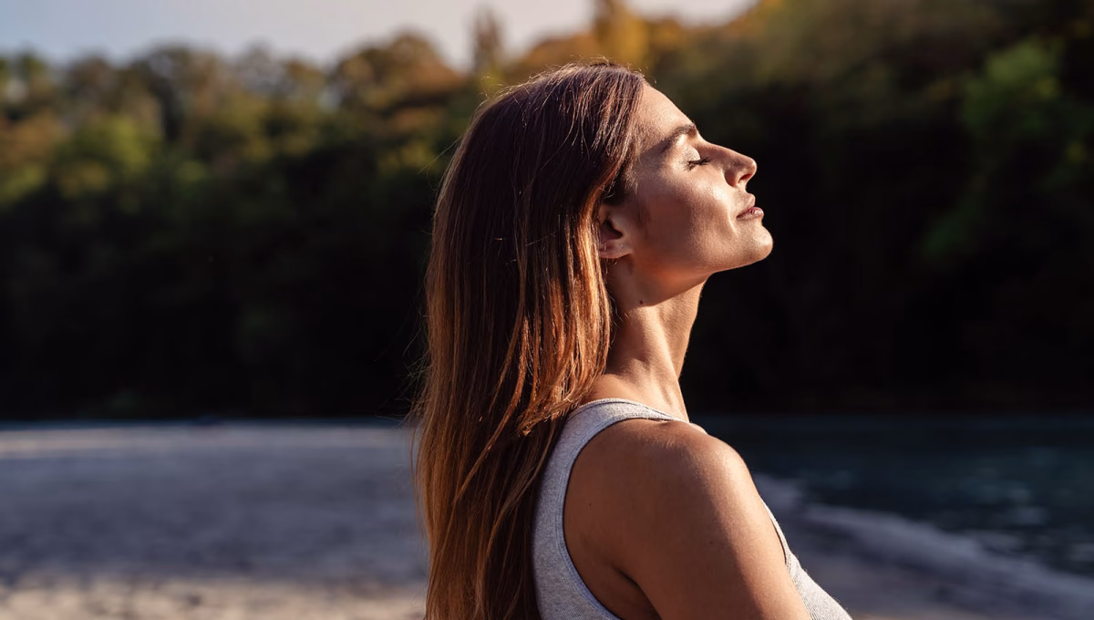 Young,Woman,With,Long,Hair,Enjoying,Sun,With,Closed,Eyes