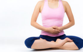 Woman,Holding,Belly,On,White,Background.