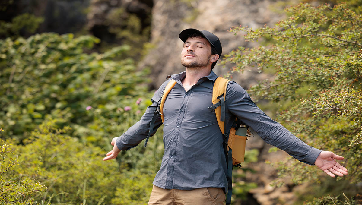 Young,Man,Enjoying,Nature,,Breathing,Deeply,The,Fresh,Air.,Let's
