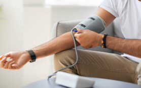 Closeup,Of,Unrecognizable,Male,Patient,Using,Modern,Tonometer,At,Home,