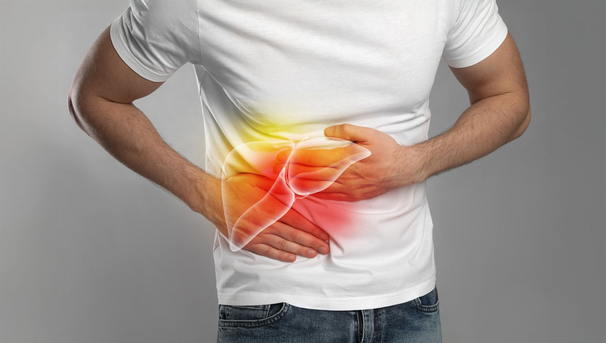 Man,Suffering,From,Liver,Pain,On,Grey,Background,,Closeup