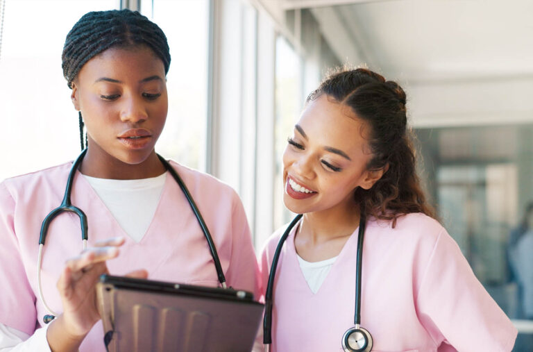 Pretty,Young,African,American,Medical,Professional,Standing,And,Looking,At