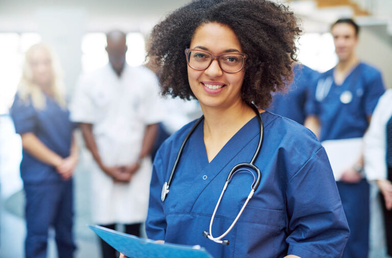Pretty,Young,African,American,Medical,Professional,Standing,And,Looking,At