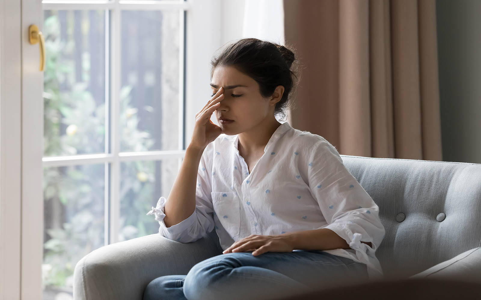 Depressed,Frustrated,Young,Indian,Woman,Suffering,From,Headache,,Migraine,,Touching