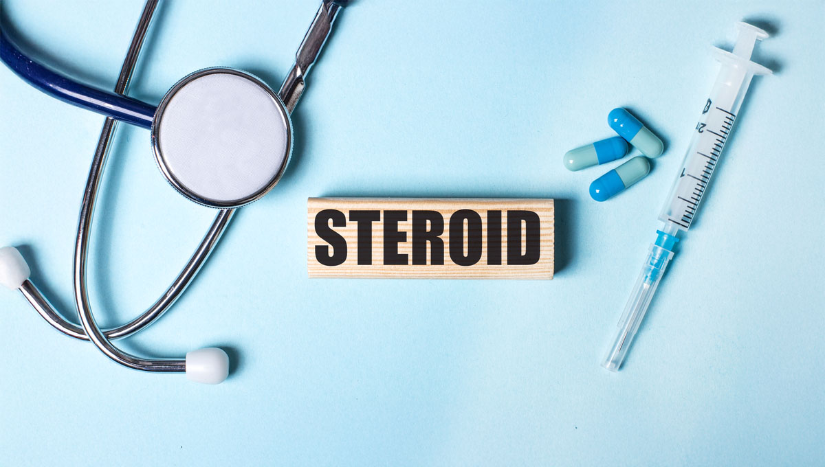 On,A,Blue,Background,,A,Stethoscope,,A,Syringe,And,Pills