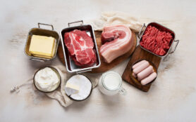 Saturated,Fats,On,Tables.,Raw,Meat,,Sausages,,Cheese,,Butter.,Bad