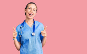 Young,Beautiful,Blonde,Woman,Wearing,Doctor,Uniform,And,Stethoscope,Success
