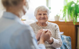 Female,Home,Caregiver,Providing,Emotional,Support,To,An,Elderly,Woman